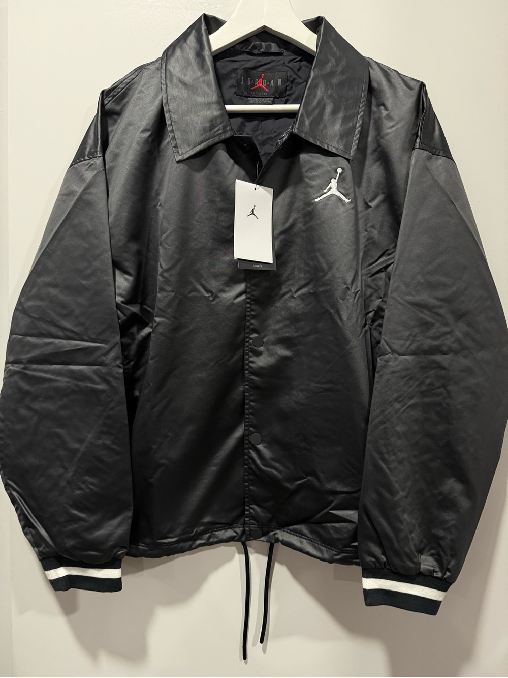 NWT Jordan Women’s Black Coach Jacket Sz M Loose Fit Snap Pockets.